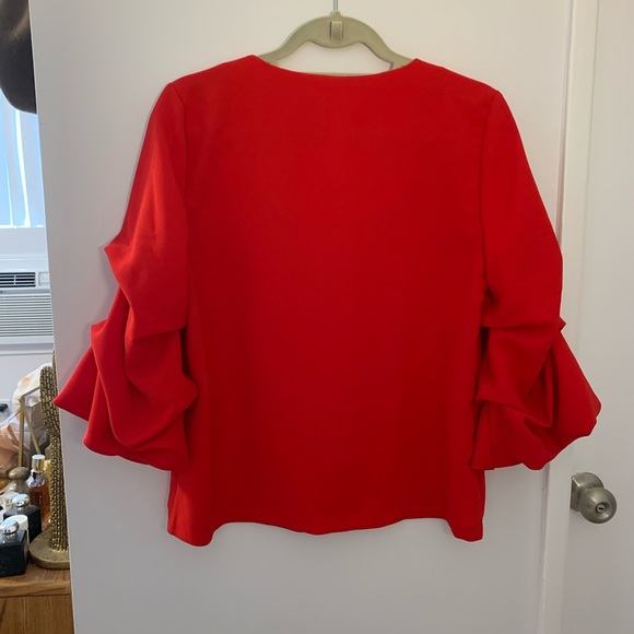Red H&M bell sleeve blouse. Super on-trend sleeves - Picture 3 of 4